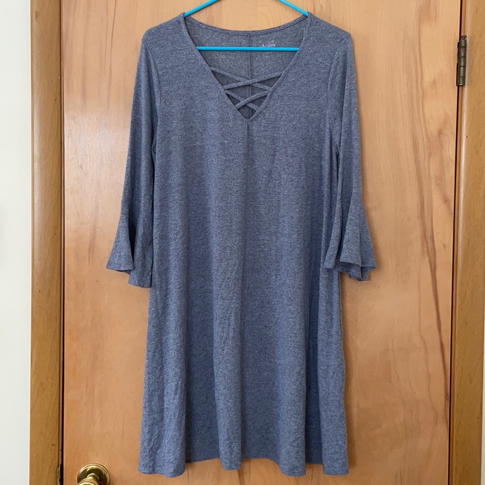 Flowing blue long sleeve v neck dress